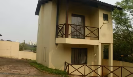Casa em condomínio fechado com 3 quartos à venda na Avenida Vicente Monteggia, 1669, Cavalhada, Porto Alegre, 208 m2 por R$ 580.000