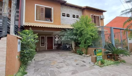 Casa em condomínio fechado com 3 quartos à venda na Rua Pau Brasil, 581, Hípica, Porto Alegre, 142 m2 por R$ 580.000