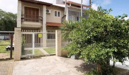 Casa com 3 quartos à venda na Rua Doutor Lauro Miguel Sturm, 217, Hípica, Porto Alegre, 118 m2 por R$ 490.000