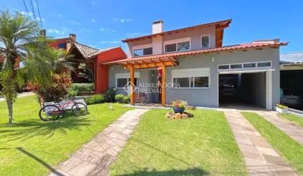 Casa em condomínio fechado com 3 quartos à venda na Avenida Juca Batista, 1200, Cavalhada, Porto Alegre, 250 m2 por R$ 1.700.000