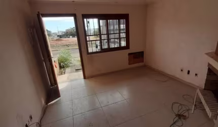 Casa com 3 quartos à venda na Rua Waldemar da Silva Tavares, 210, Guarujá, Porto Alegre, 108 m2 por R$ 450.000