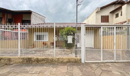 Casa com 3 quartos à venda na Rua Coelho da Costa, 15, Nonoai, Porto Alegre, 300 m2 por R$ 690.000