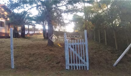 Terreno em condomínio fechado à venda na Rua dos Ipês Roxo, 21, Tarumã, Viamão, 446 m2 por R$ 150.000