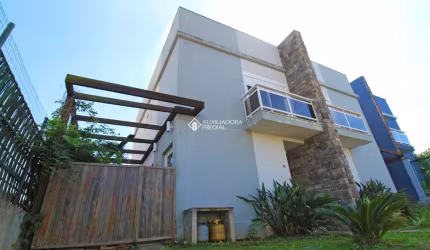 Casa em condomínio fechado com 3 quartos à venda na Rua Sérgio Iglésias Barcellos, 34, Lomba do Pinheiro, Porto Alegre, 100 m2 por R$ 580.000