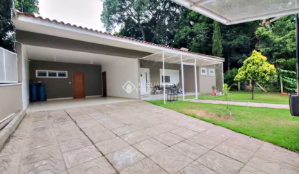 Casa em condomínio fechado com 4 quartos à venda na Professor Bolívar Fontoura, 450, Vila Nova, Porto Alegre, 220 m2 por R$ 1.290.000
