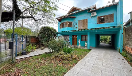 Casa em condomínio fechado com 3 quartos à venda na Rua Barão do Amazonas, 3254, Partenon, Porto Alegre, 250 m2 por R$ 800.000