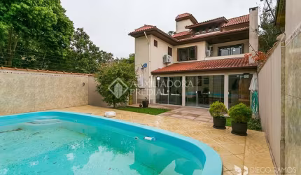 Casa em condomínio fechado com 3 quartos à venda na Rua Cassino, 75, Ipanema, Porto Alegre, 379 m2 por R$ 980.000