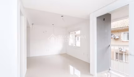 Casa em condomínio fechado com 3 quartos à venda na Rua Padre João Batista Reus, 2754, Camaquã, Porto Alegre, 123 m2 por R$ 475.000