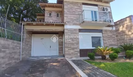 Casa com 3 quartos à venda na Rua Sepé Tiaraju, 1352, Nonoai, Porto Alegre, 171 m2 por R$ 904.000