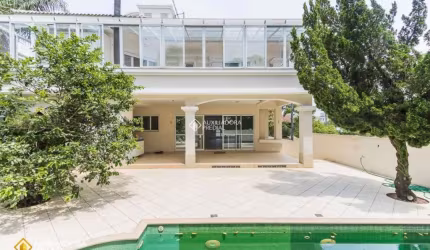 Casa com 5 quartos à venda na Rua das Tibiras, 241, Jurerê Internacional, Florianópolis, 365 m2 por R$ 5.500.000