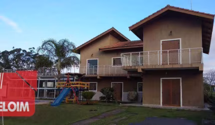 Sobrado com 4 dormitórios à venda, 350 m² por R$ 1.100.000,00 - Condomínio Ninho Verde I Eco Residence - Porangaba/SP