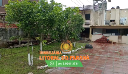 Terreno 300m²com casa próximo ao mar