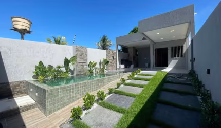 Casa com 3 dormitórios à venda, 140 m² por R$ 570.000 - Carapibus - Conde/PB