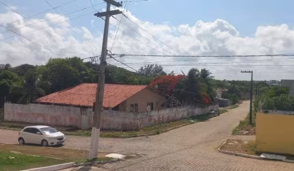Casa com 3 dormitórios à venda por R$ 900.000 - Carapibus - Conde/PB