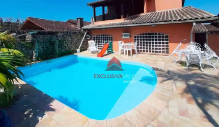 Casa com 4 dormitórios à venda, 265 m² por R$ 1.100.000,00 - Martim de Sá - Caraguatatuba/SP