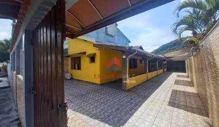 Casa com 2 dormitórios à venda, 153 m² por R$ 680.000,00 - Sumaré - Caraguatatuba/SP