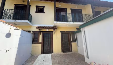 Village com 2 dormitórios à venda, 69 m² por R$ 690.000,00 - Centro - Bertioga/SP
