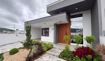 Casa com 3 dormitórios à venda, 128 m² por R$ 850.000,00 - Forquilhas - São José/SC