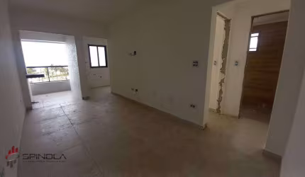 Apartamento com 2 dormitórios à venda, 53 m² por R$ 406.000,00 - Maracanã - Praia Grande/SP