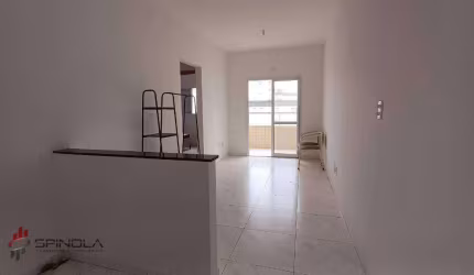 Apartamento com 2 dormitórios à venda, 53 m² por R$ 349.000,00 - Caiçara - Praia Grande/SP
