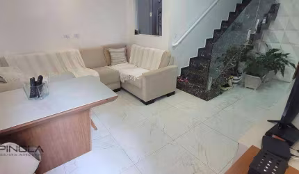 Sobrado com 2 dormitórios à venda, 73 m² por R$ 410.000,00 - Caiçara - Praia Grande/SP