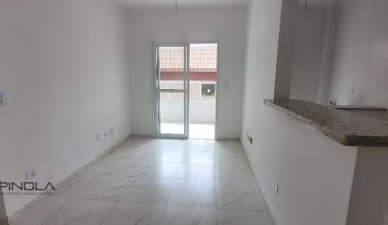 Apartamento com 2 dormitórios à venda, 61 m² por R$ 441.416,96 - Caiçara - Praia Grande/SP