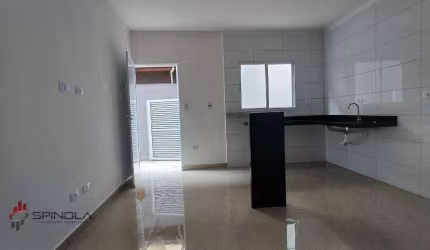 Casa com 2 dormitórios à venda, 70 m² por R$ 450.000,00 - tude basto - Praia Grande/SP