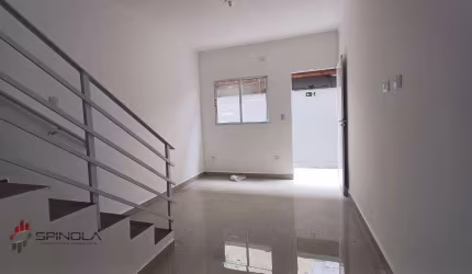 Sobrado com 2 dormitórios à venda, 62 m² por R$ 460.000,00 - tude basto - Praia Grande/SP