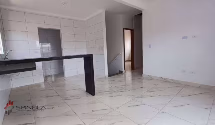 Casa com 2 dormitórios à venda, 70 m² por R$ 550.000,00 - tude basto - Praia Grande/SP