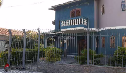 Sobrado com 4 dormitórios à venda, 710 m² por R$ 1.200.000,00 - Solemar - Praia Grande/SP
