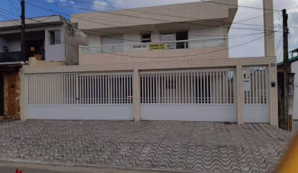 Casa com 2 dormitórios à venda, 67 m² por R$ 315.000,00 - tude basto - Praia Grande/SP