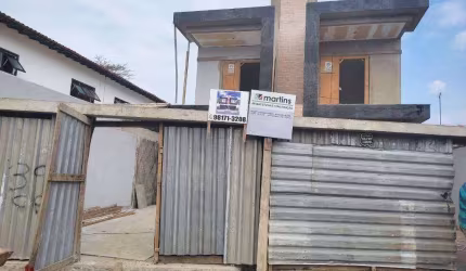 Sobrado com 3 dormitórios à venda, 138 m² por R$ 710.000 - Solemar - Praia Grande/SP