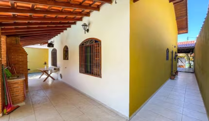 Casa Térrea com piscina à venda com piscina, 3 quarto(s),  sendo 2 suíte(s)  no bairro Cidade Nova Peruíbe, 850 metros da praia, Peruíbe-SP