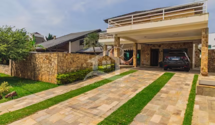 Casa Assobradada para alugar com piscina, 5 quarto(s),  sendo 5 suíte(s)  no bairro Bougainville Residencial I, 0 metros da praia, Peruíbe-SP
