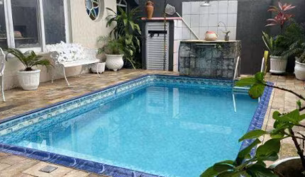 Casa com 3 dormitórios à venda, 166 m² por R$ 1.200.000,00 - Tupi - Praia Grande/SP