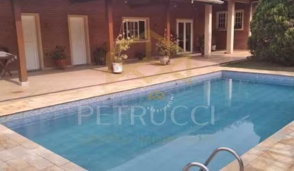 Casa com 3 dormitórios à venda, 580 m² por R$ 1.950.000,00 - Condomínio Clube de Campo Valinhos - Valinhos/SP
