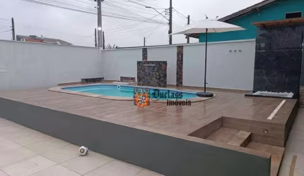 Casa com 3 dormitórios e 6 kit nets  à venda, 420 m² por R$ 699.999 - Balneário dos Golfinhos - Caraguatatuba/SP
