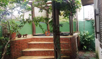Casa com 4 dormitórios à venda, 160 m² por R$ 1.000.000 - Balneário Praia do Pernambuco - Guarujá/SP