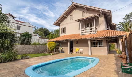 Casa com 3 quartos à venda na Rua Índia, 21, Petrópolis, Novo Hamburgo por R$ 790.000