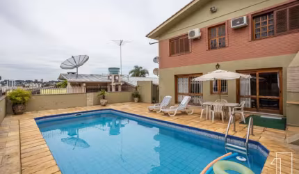 Casa com 4 quartos à venda na Rua Três de Outubro, 172, Pátria Nova, Novo Hamburgo por R$ 809.000