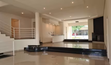 Casa em Condomínio com 5 suítes - 900m²