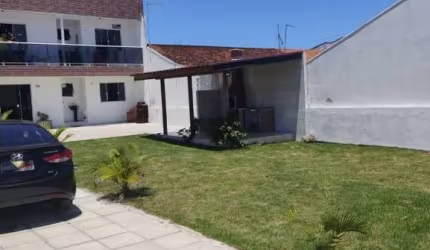 Sobrado a venda com terreno, 02 pisos, 04 quartos, poucos metros do Mar em Matinhos PR