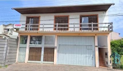 (PERMUTA) Casa dois pisos 05 quartos c/suíte, comercial/residencial em Flores da Cunha RS
