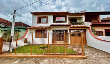 Casa com 3 quartos à venda na Beco Rui Barbosa, 469, Fátima, Canoas, 196 m2 por R$ 940.000