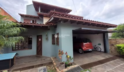Casa em condomínio fechado com 4 quartos à venda na Rua Nazaré, 48, Nossa Senhora das Graças, Canoas, 232 m2 por R$ 1.200.000