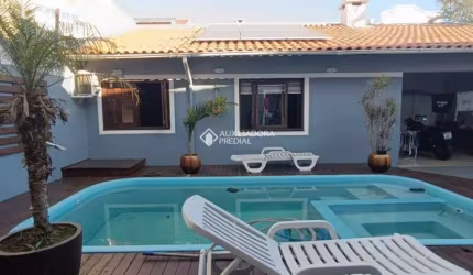Casa com 3 quartos à venda na Rua Suécia, 209, Marechal Rondon, Canoas, 190 m2 por R$ 1.225.000
