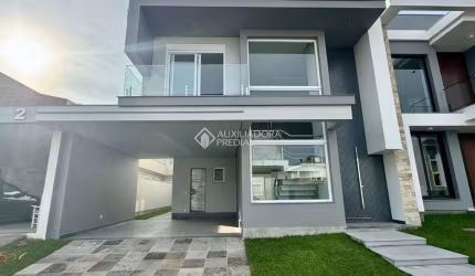 Casa em condomínio fechado com 3 quartos à venda na Rua dos Pinheiros, 71, Igara, Canoas, 257 m2 por R$ 1.980.000