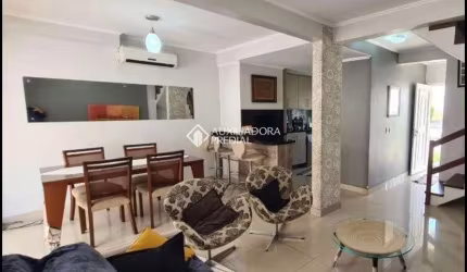 Casa em condomínio fechado com 3 quartos à venda na Avenida Açucena, 650, Estância Velha, Canoas, 154 m2 por R$ 798.000