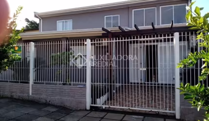 Casa em condomínio fechado com 3 quartos à venda na Rua Tupi, 408, Igara, Canoas, 108 m2 por R$ 499.000