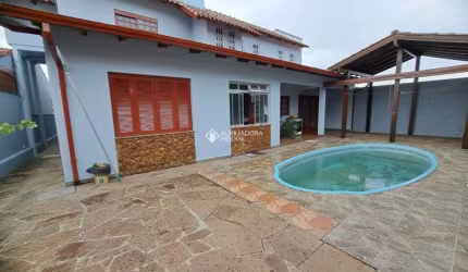 Casa com 4 quartos à venda na Rua das Araras, 1650, Harmonia, Canoas, 371 m2 por R$ 841.000